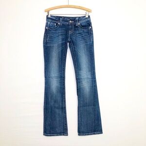 Miss Me Low rise boot, cut jeans
